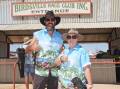 Punters get ready to enter the April Birdsville Races on Sunday.
