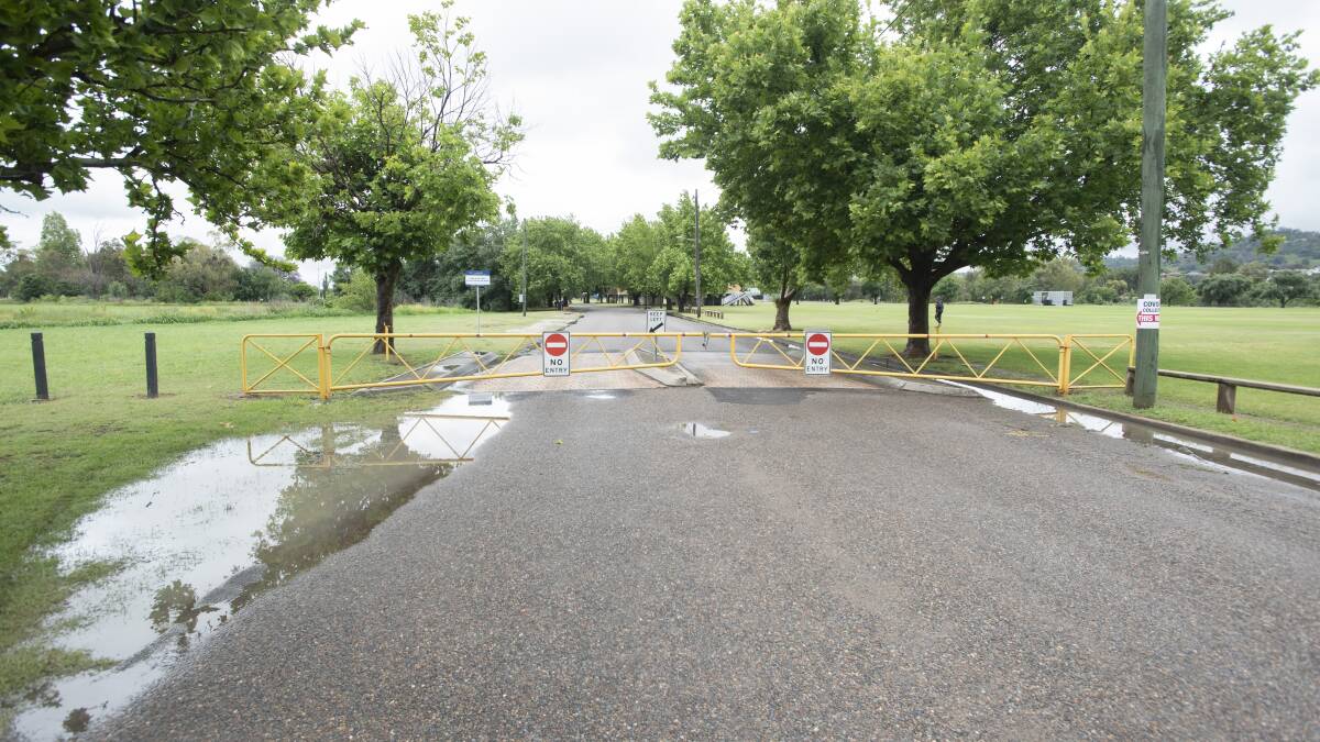 FORGET IT: Emergency services have reminded locals to never enter floodwater as the region braces for heavy rainfall and rises in the rivers. Photo: Peter Hardin, file