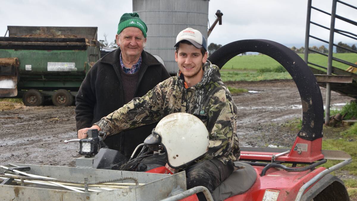 SAFETY FIRST: Gippsland dairy farmer and agent Roger Tweddle with grandson Corey Ford at his family's Darnum dairy farm where they use quad bikes on a daily basis.