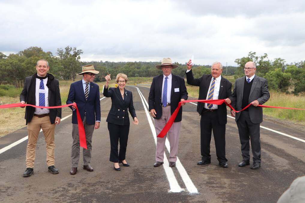 CUTTING THE RIBBON: Gwydir council's Alex Eddy, State MP Adam Marshall, NSW Governor Margaret Beazley AZ QC, Federal MP Mark Coulton, Gwydir Shire Mayor John Coulton and GM Max Eastcott open the $8.1 million bypass on Thursday. Photo: Supplied