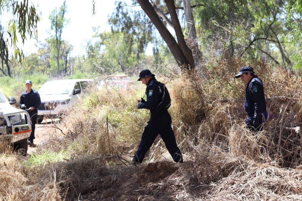 DANGEROUS CONDITIONS: Police conduct a search of the area where Gordon Copeland went missing along the Gwydir River near Moree. Photo: File, Jacinta Dickins