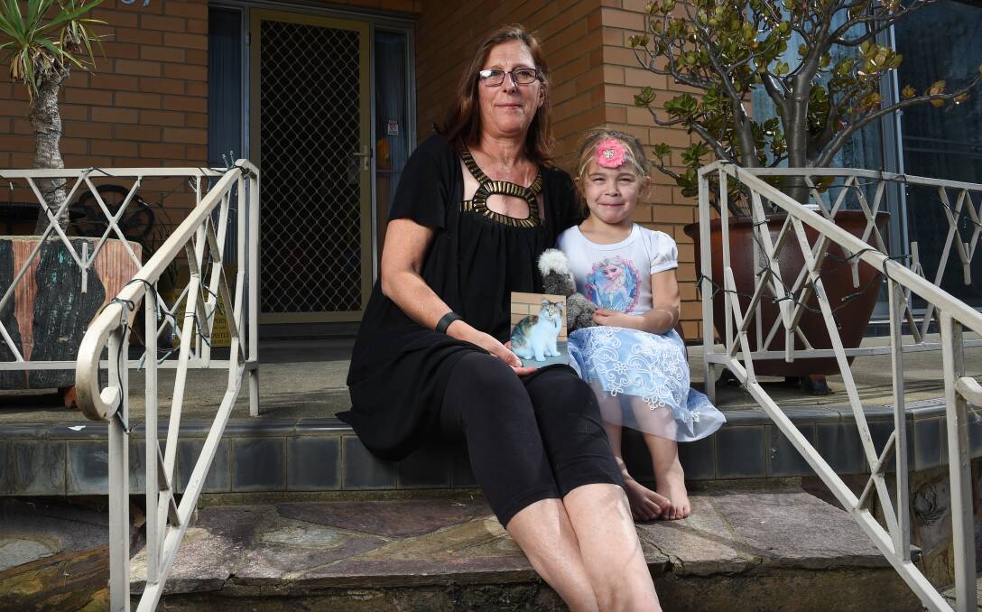 A PET LOST:  Bronnie Lehmann, with grandaughter Azaiah Lehmann, 4, has no idea what happened to her cat Peaches. Picture: MARK JESSER