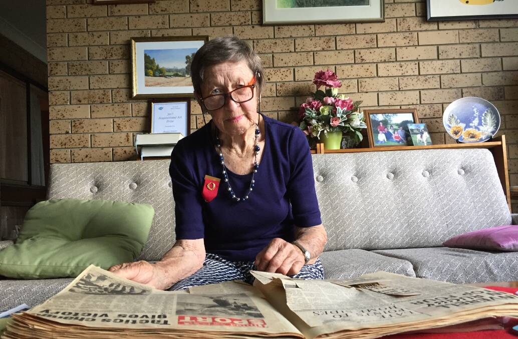 Marjory Schmidt looks through her scrap book of memories, and remembers her incredible life with five sons, 13 grandkids, seven great grandkids and one great great grandchild