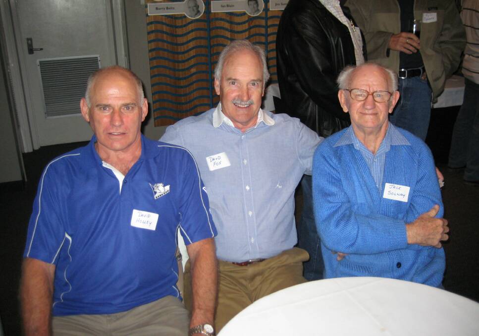Jack Solway (wearing glasses), with friends, at a football function in 2010