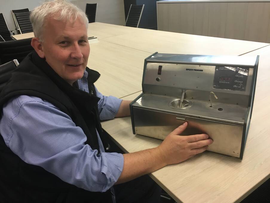 GrainGrowers' CEO Dr Michael Southan with an example of the Bluret Protein Measurement Machine - technological disrupter of its day. 