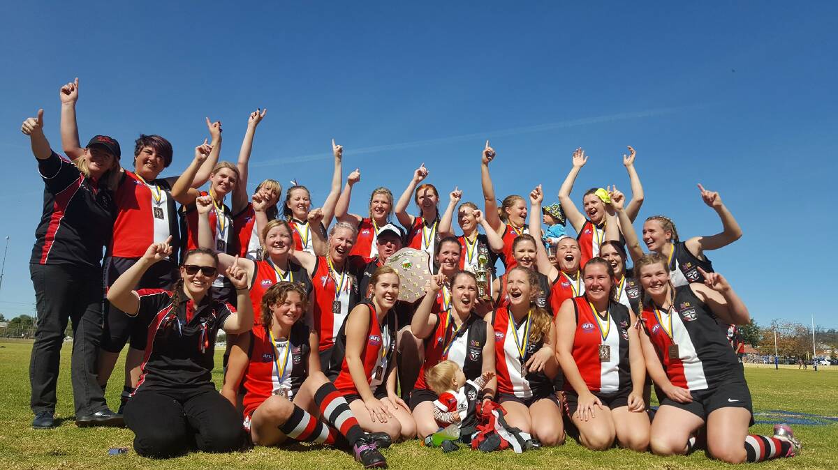 The Inverell Saints women's team, pictured here after the 2017 flag, are still the reigning champions in the Crosswords Cup after the competition was cancelled in 2019.