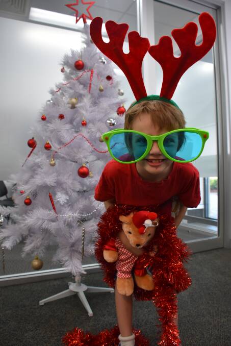 Ari Durand was one of the little elves who passed by the Inverell Times office. Photo: Naomi Shumack