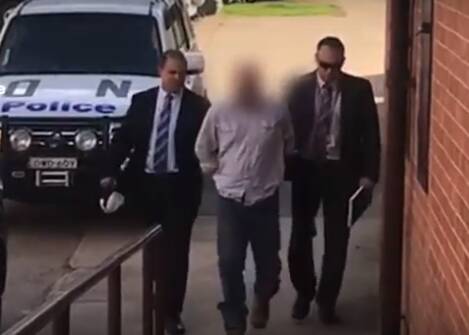 James Scott Church was lead to Inverell Police Station on Thursday, following his arrest