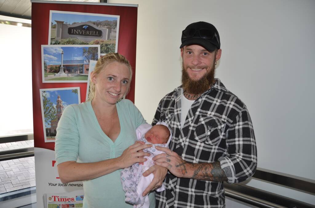 Proud parents Nikki Watts and Todd McNulty with their second daughter, little Baylee.