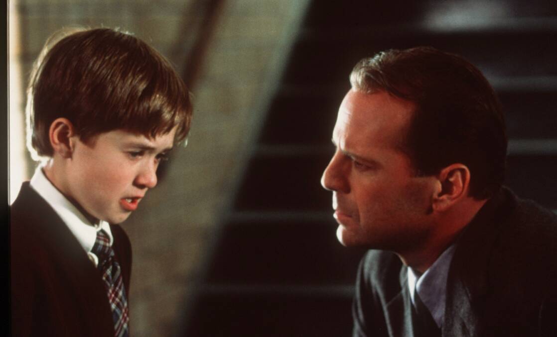 Haley Joel Osment, left, and Bruce Willis in The Sixth Sense. Picture: Supplied