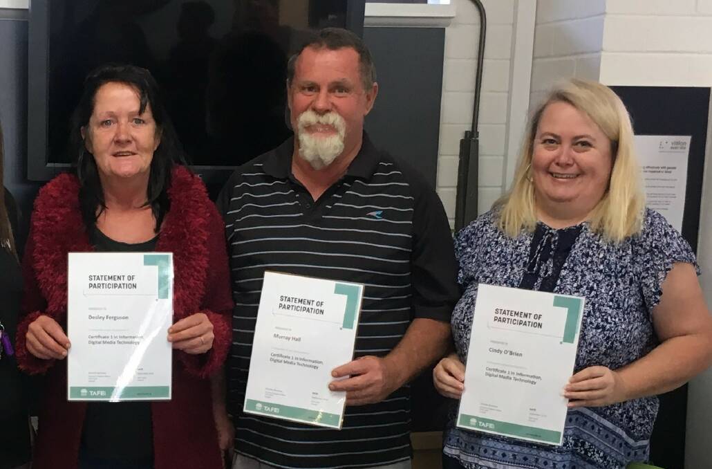 Murray Hall (centre), pictured with TAFE NSW students Desley Ferguson and Cindy O’Brien, who also completed the course recently.