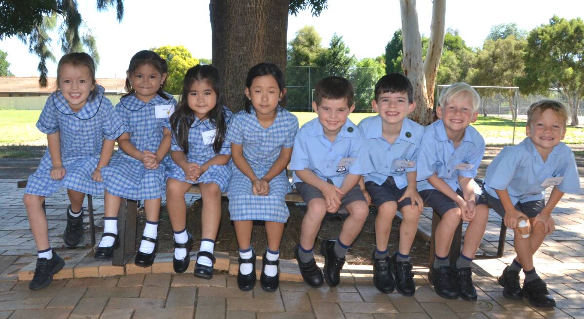 Maddi Campbell, Kaye Sarsaba, Chanci Buenvenida, Melisa Nguyen, Ollie Sinclair, Julian Collins, Lachlan Tindall and Ben Browett on their first day at Holy Trinity School.