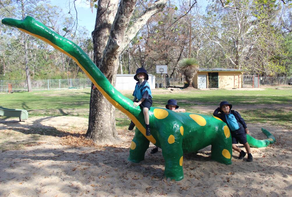 Jayde, Bentley and Jed enjoy the newly renovated dinosaur.
