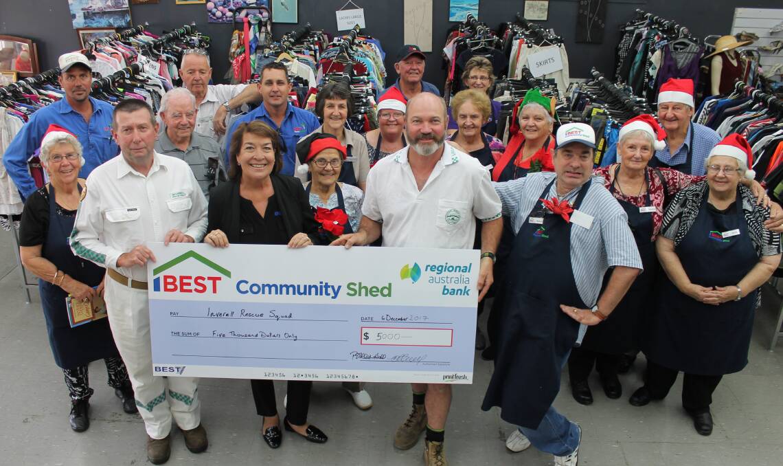 ASSISTANCE: Holding the $5000 cheque are VRA Secretary Chris Reeves (left)
and Captain Jason Tom with BEST CEO Penny Alliston-Hall (centre) and a raft of Shed
volunteers.