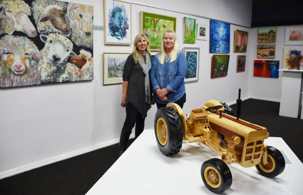 Varied: Art Gallery manager Jo Williams and Inverell Art Society president Christina Smith stand among several of the artworks in this year's event. 