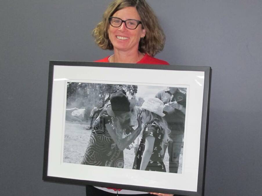 Michèle Jedlicka displays the winning photo. Michèle also won the grand champion prize for her piece 'Reverie', which depicts a young ballerina. 