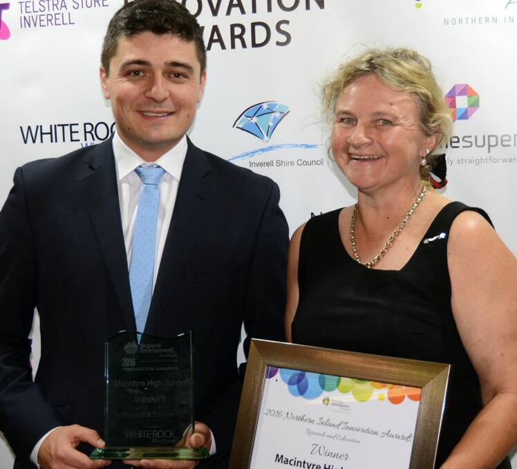 Technical Services Manager for Goldwind Australia, Steven Nethery presented the White Rock Wind Farm ‘Research and Education’ winner’s trophy to Macintyre High school’s Deb Snaith.