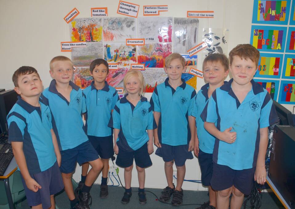 Class 2/3/4 with their crayon drawings of the bushfire. 