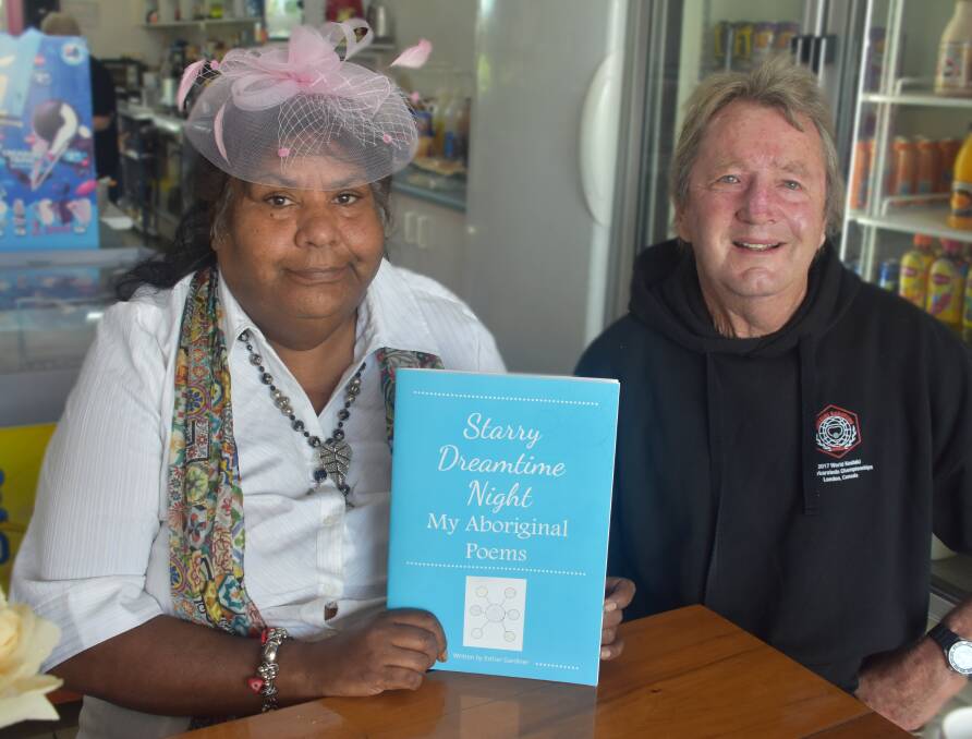 Sharing culture: Poet Esther Gardiner displays her new book with Inverell Shire councillor Paul King, who has been one of her biggest supporters over the years.