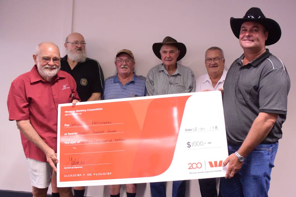 Chairman of the Inverell Westpac Helicopter Support Group Ken Harrison receives a $1000 cheque from Tingha Buffalo Lodge members Jim Curtin, Stephen Towse, Mervyn Burdekin, Larry Frappell and Laurence Burdekin.