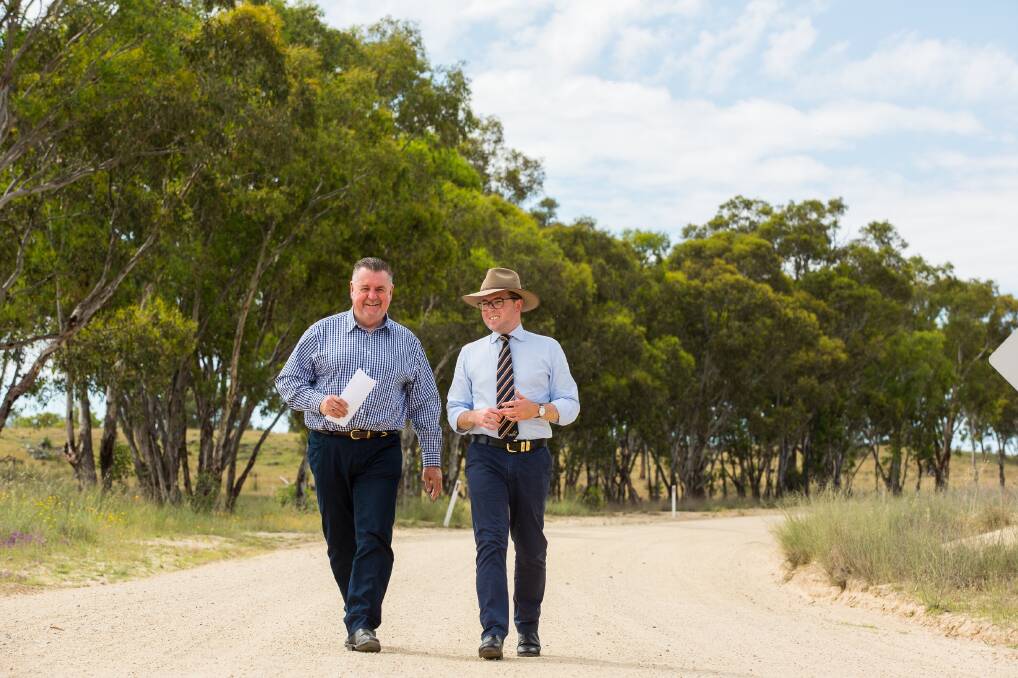 Uralla Shire Mayor Mick Pearce and Northern Tablelands MP Adam Marshall on the soon-to-be sealed section of Bingara Road