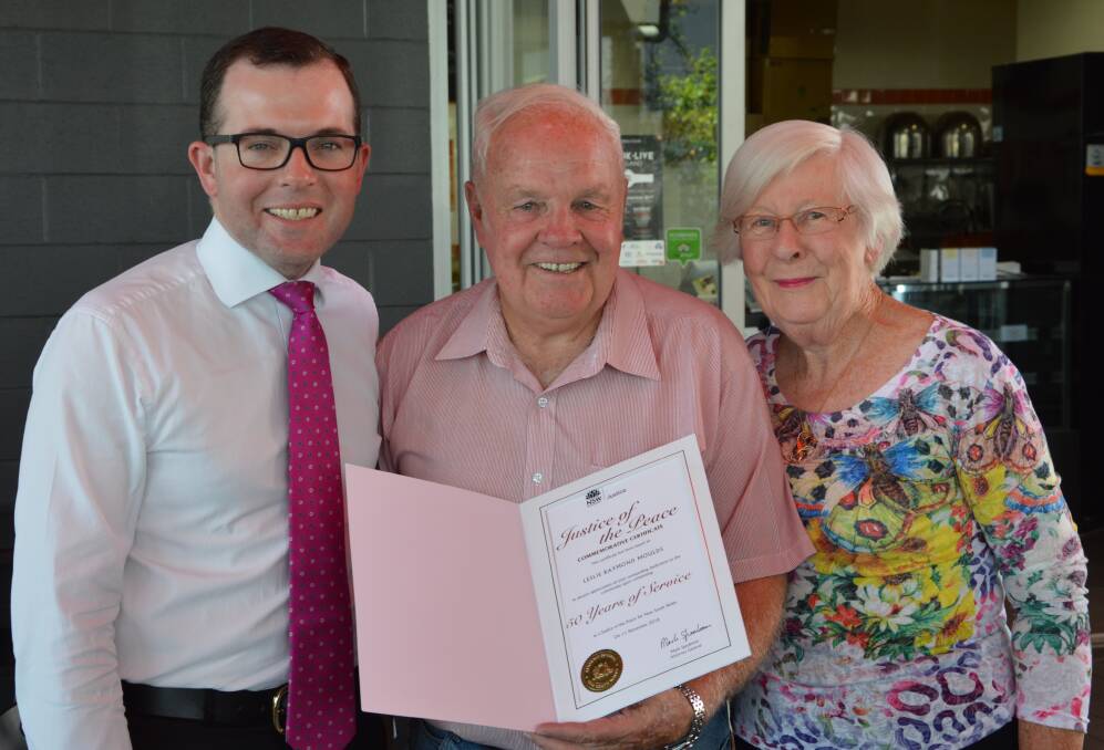 Member for Northern Tablelands Adam Marshall presents Inverell Justice of the Peace Les Moulds with a certificate commemorating his long service to justice in NSW. Les’ wife Yvonne is also pictured.
 