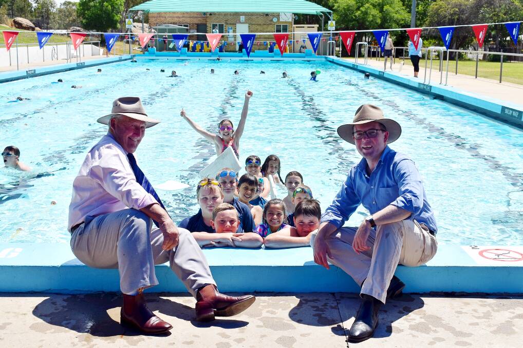 Gwydir Shire Councillor David Coulton, and Northern Tablelands MP Adam Marshall at the Warialda Pool with students from Warialda Public School last week.