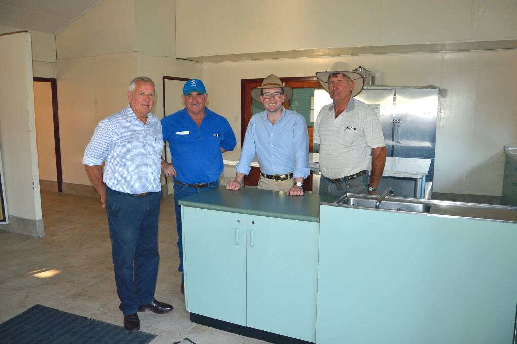 Gwydir Shire Mayor and Showground trustee John Coulton with Trust president David Moor, Northern Tablelands MP Adam Marshall and trustee Lex Roberts in the preparation area of the kitchen.
