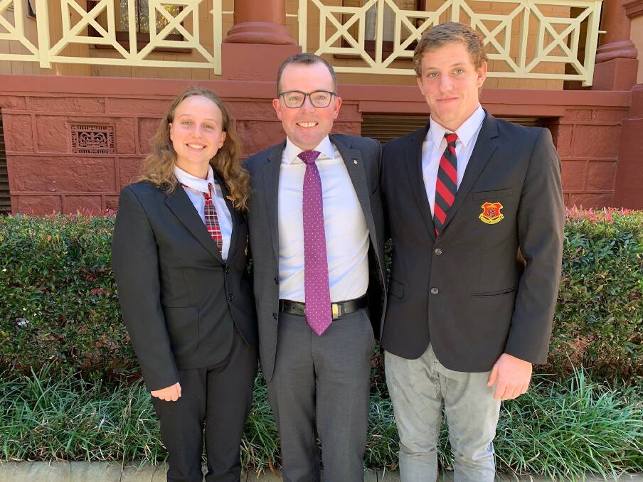 Inverell High School captains Ruby Walker and Bailey Thomas with Northern Tablelands MP Adam Marshall (centre) at Parliament House.