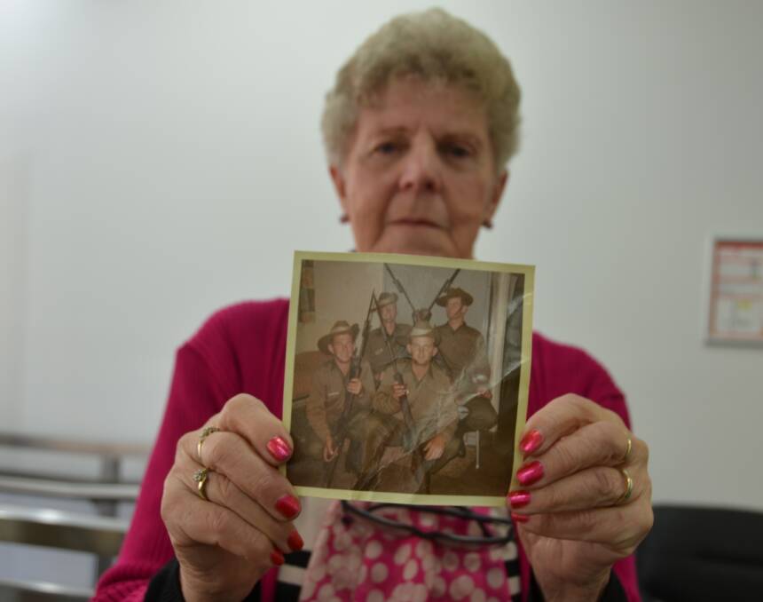 Tingha RSL secretary Audrey McArdle is keen to return the photo to descendants of the men pictured. 
