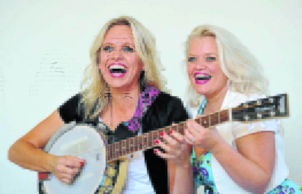 LOVE: Country singer Beccy Cole with partner Libby O'Donovan, an inspiration for her new album Lioness. The album has broken a number of Australian firsts.