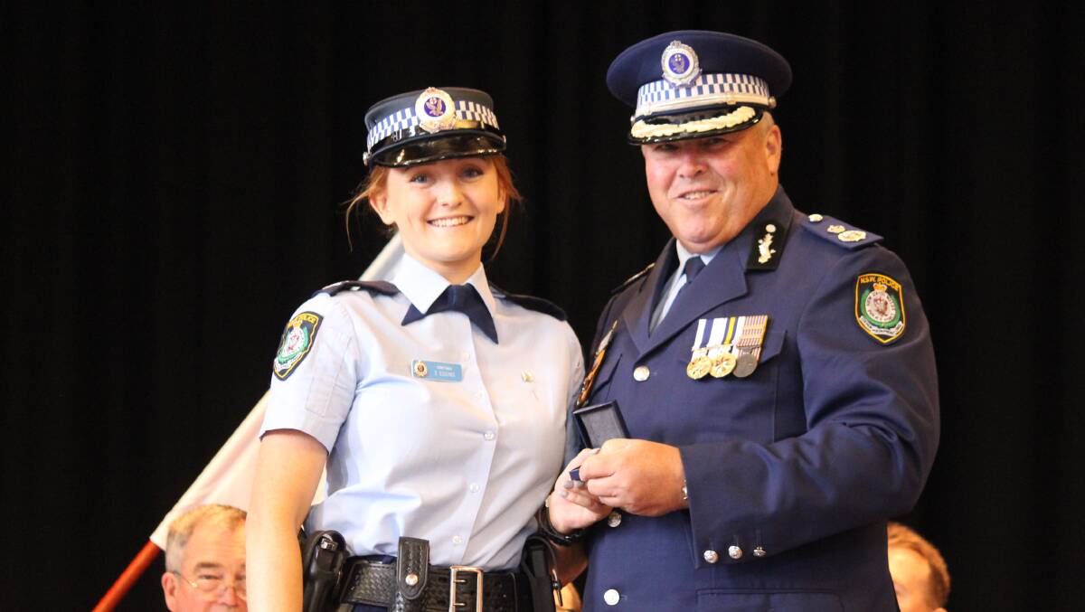 SECURITY OPERATION: New England Local Area Command Senior Constable Sherry Eggins from Inverell received a Queensland Police Pin on Wednesday.