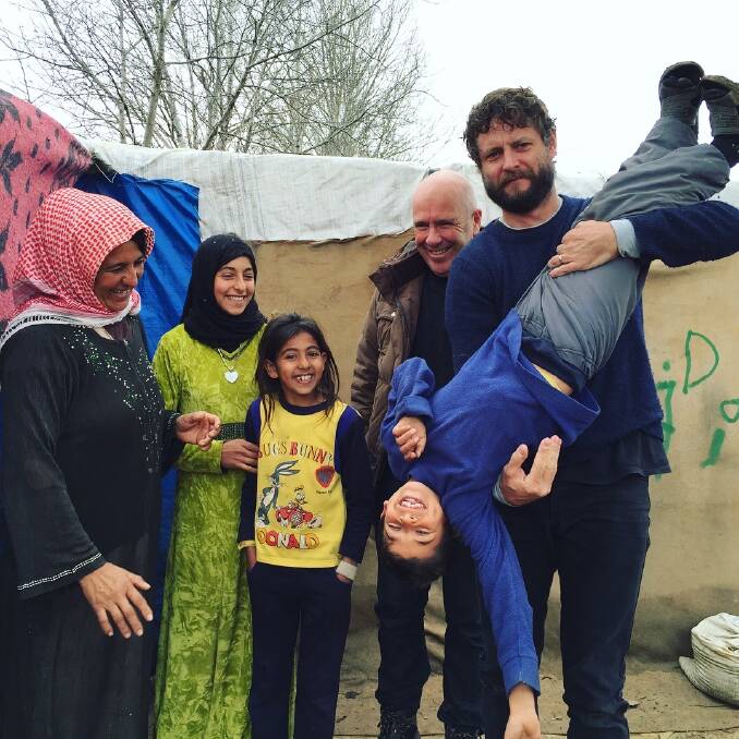 Ben Quilty and author Richard Flanagan visited Middle Eastern refugee camps with World Vision in 2016.