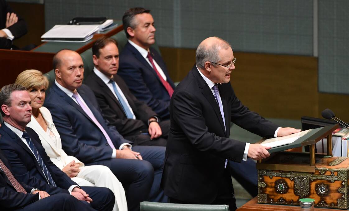 MISPLACED CONFIDENCE?: Treasurer Scott Morrison during the delivery of the 2017-18 Federal Budget at Parliament House on Tuesday. Photo: AAP Image/Mick Tsikas.