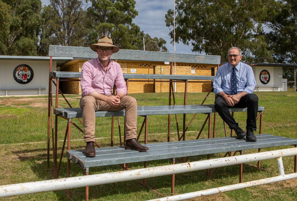 Tingha Tigers: Northern Tablelands MP Adam Marshall and Inverell Shire Deputy Mayor Anthony Michael on the old grandstands which are about to be replaced.