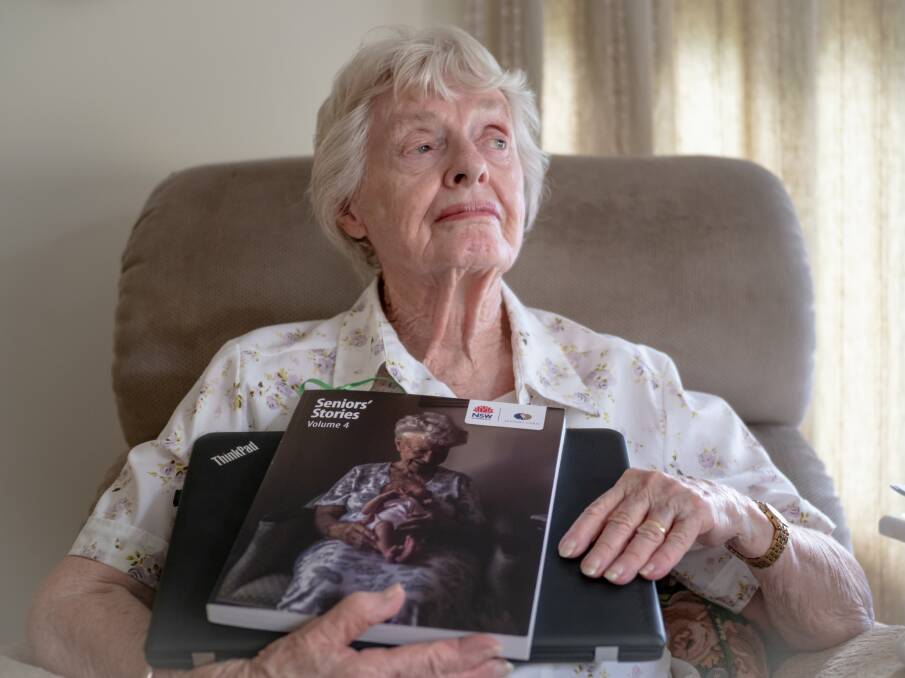 Writer: Kathleen Gaukroger commemorates the publishing of one of her stories in Seniors' Stories Vol. 4, a publication of the NSW Government Seniors Card website. Photo taken by Rob Smith.