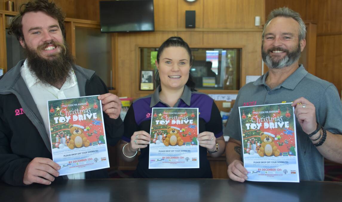 Accepting donations: Peter Mason, Tayla Mepham and James 'Monte' Irvine have invited residents to contribute new and newly made toys and books to assist struggling local families this Christmas.
