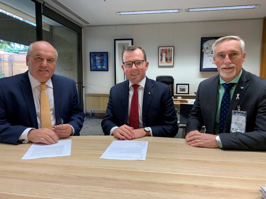 Police Minister David Elliot, Northern Tablelands MP Adam Marshall and Inverell Shire Mayor Paul Harmon discussing the new Inverell Police Station in Parliament last week.