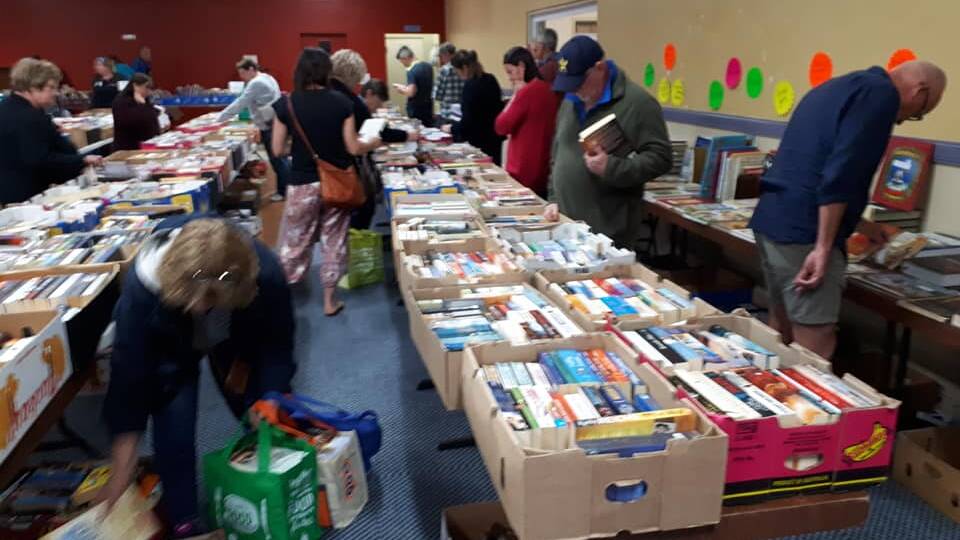 Bargain sale: Head down to Flanders House to see the huge collection of donated books selling for cheap to raise funds for local youth.