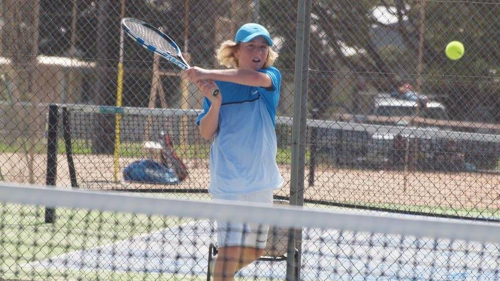 Ben Butler plays in the 2017 Club Championship. Photo by Inverell Tennis Club.