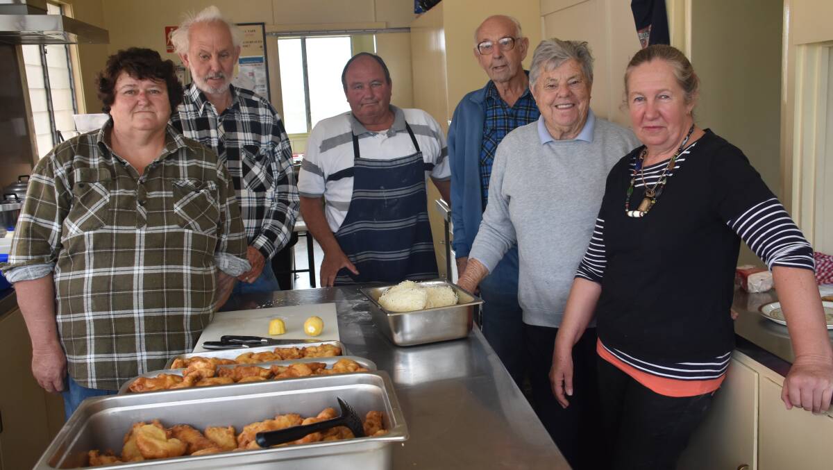 Community Kitchen volunteers Dawn and Steven Hobday, Bill Floyd, Tony and Laurel King and Kim Laidlaw invite you to feast every Tuesday at the Uniting Church Hall.
