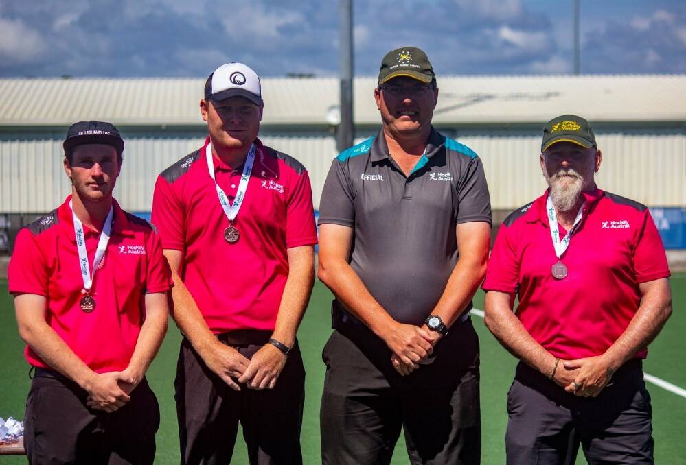 Masters opportunity: Inverell's Tristen White (second from left) spent two weeks in Perth umpiring at an Australian Men's Masters Hockey recently.