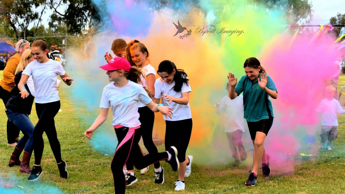 Kids enjoying the colour run.