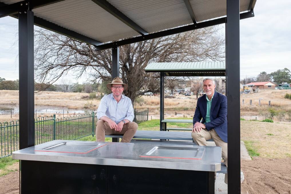 Northern Tablelands MP Adam Marshall and Inverell Shire Mayor Paul Harmon check out the new steel covered grandstands at Tinghas recreation reserve and the new public barbecue facilities at Grahame Park.