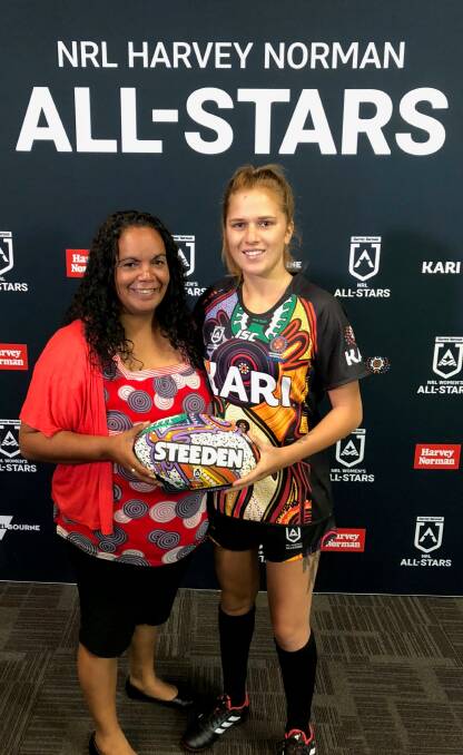 Centre stage: Gomeroi artist Elenore Binge attended the launch in Sydney last week to see her design featured on the jerseys and game ball.