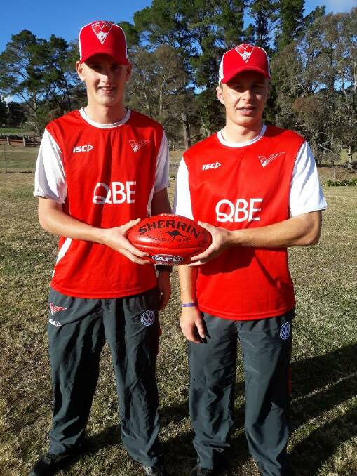 OPPORTUNITY KNOCKS: Lachie Martin and Morgan Dunn at the Dunn family's cattle farm outside Walcha on Thursday morning. Photo: Supplied.
