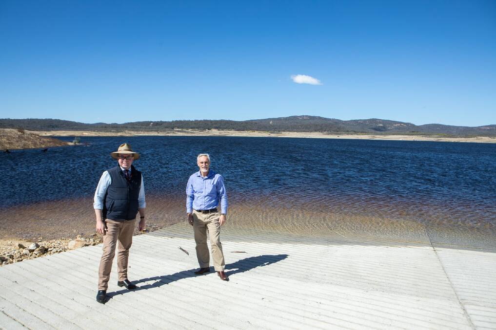 Inverell Shire Mayor Paul Harmon, left, and Northern Tablelands MP Adam Marshall inspecting the new concrete boat ramp  the longest in Australia  constructed as part of the $5.7 million redevelopment of the Copeton Dam Northern Foreshore.