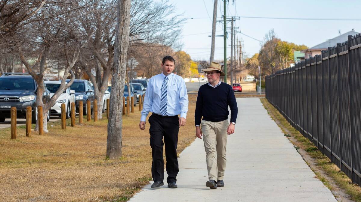 Northern Tablelands MP Adam Marshall, right, with Inverell Shire Councils Manager Civil Engineering Justin Pay on the shared pathway near Inverell Public School.