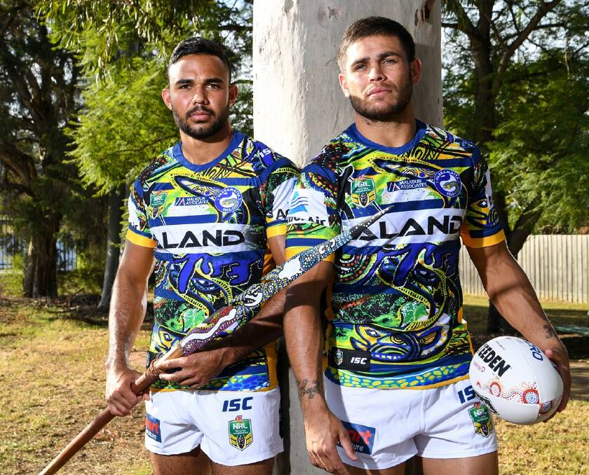Eels players Bevan French and Will Smith model the 2018 Eels Indigenous Jersey, designed by Elenore, ahead of the NRL Indigenous Round tonight.