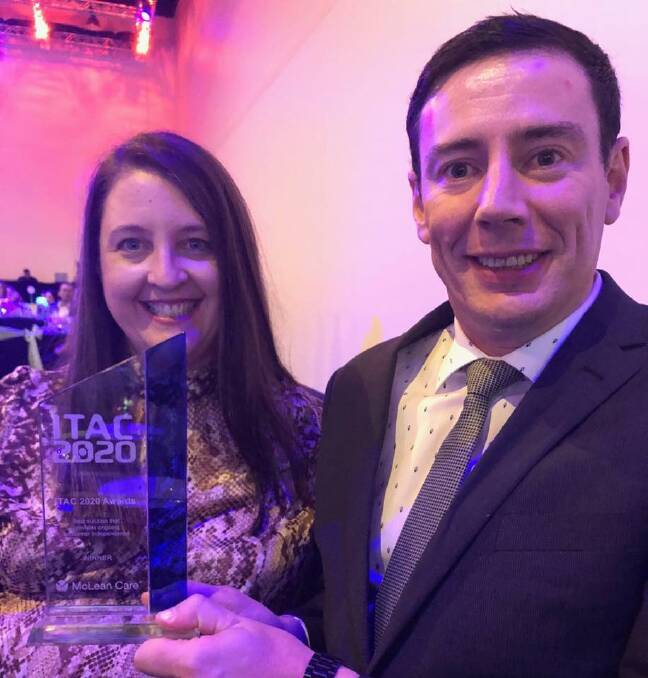 Recognition: McLean Care's Project manager Alicia Eugiene accepts two awards with Ben Horan from Deakin University at the Information Technology in Aged Care (ITAC) conference awards. Photo: Supplied.